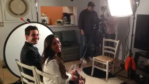 Filming an interview in a living-room set