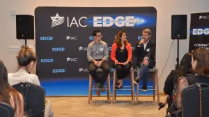 Panel discussion on stage at IAC EDGE